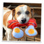 Dog enthusiastically chewing on bacon and eggs dog toy filled with Juananip, ideal for medium dogs needing calming and fun playtime.